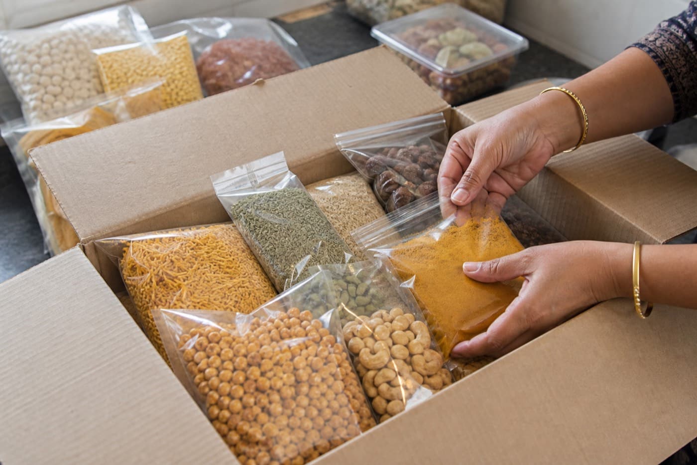 Packaged food items prepared for delivery abroad from India by international courier